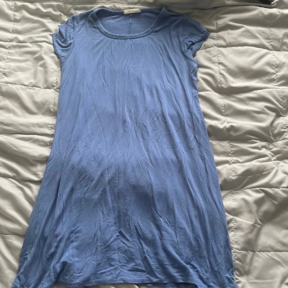 Both size L. Very comfortable. Knee length.